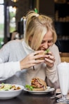 woman eating burger