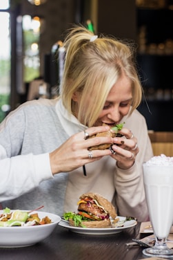 woman eating burger