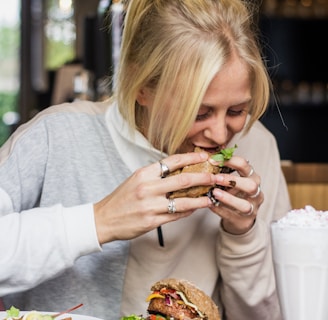 woman eating burger