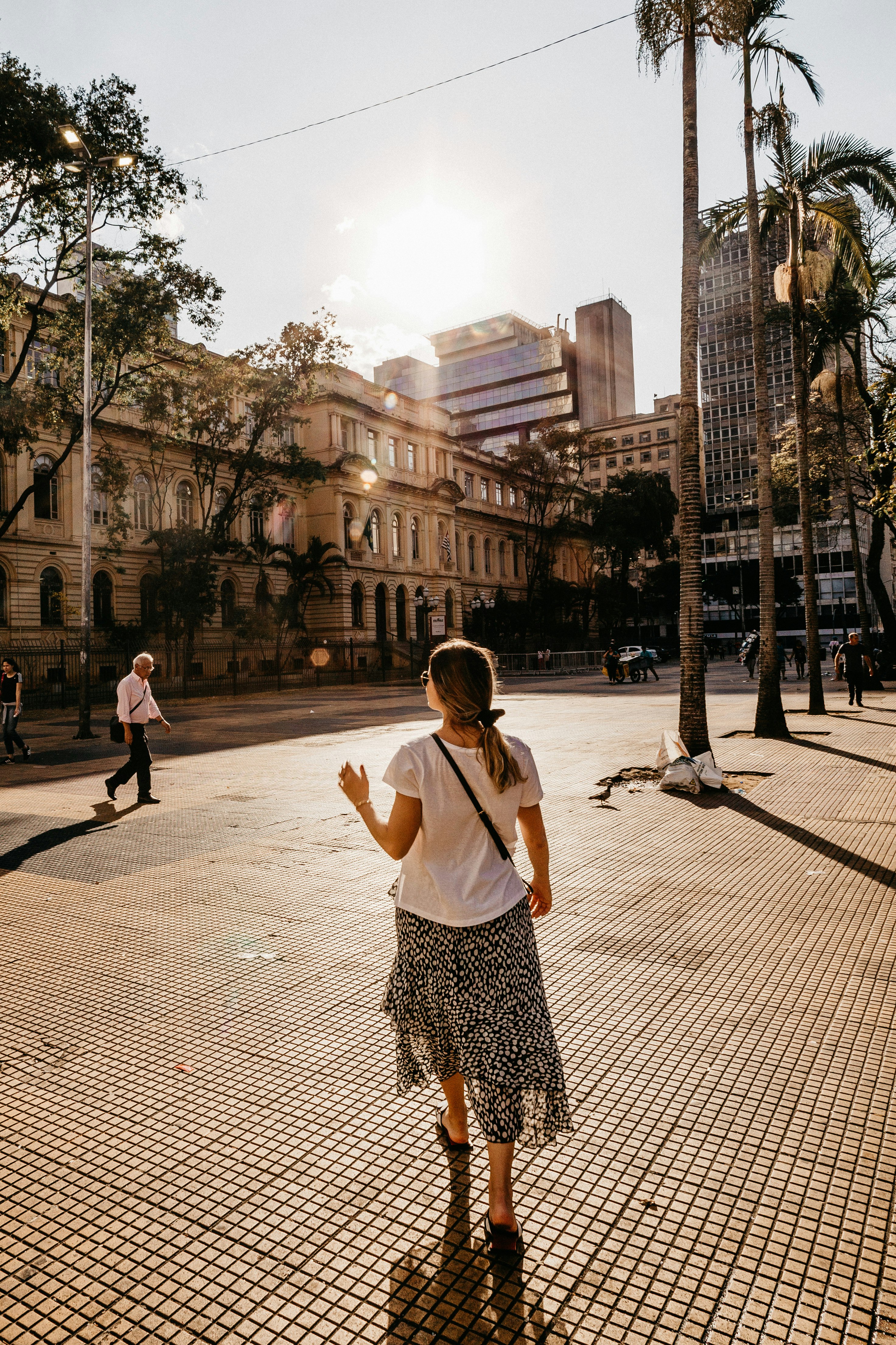 woman walking on road