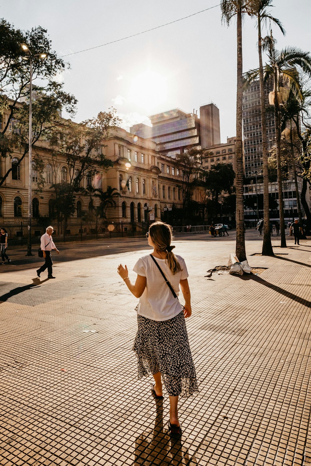 woman walking on road