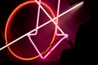 Close-up of colorful LED tubing forming a playful script sign.