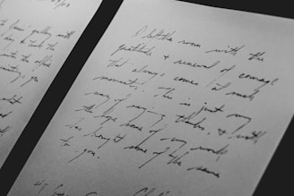 two white printer papers