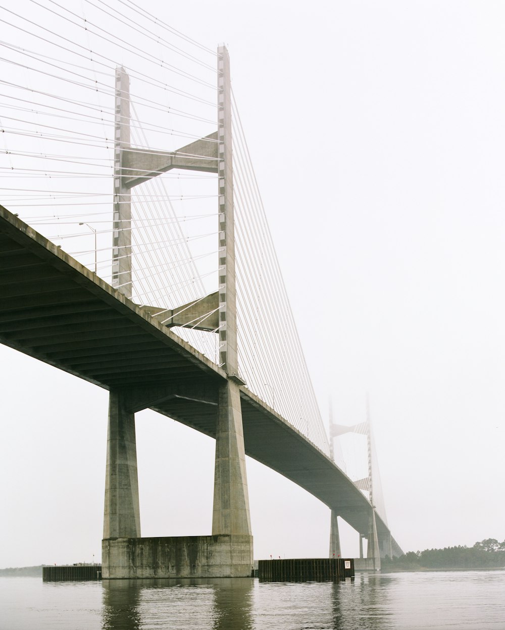 self-anchored suspension bridge during daytime