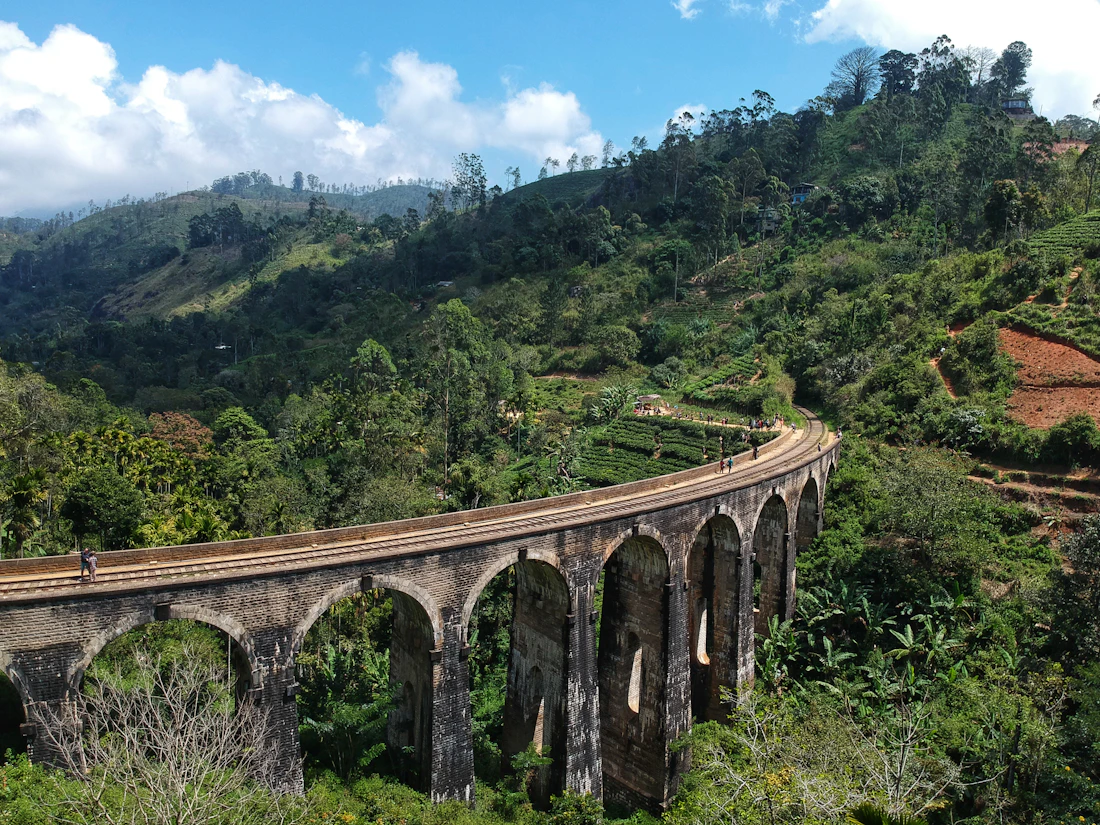 Nine Arch Bridge surrounded by green hills in Ella, Sri Lanka