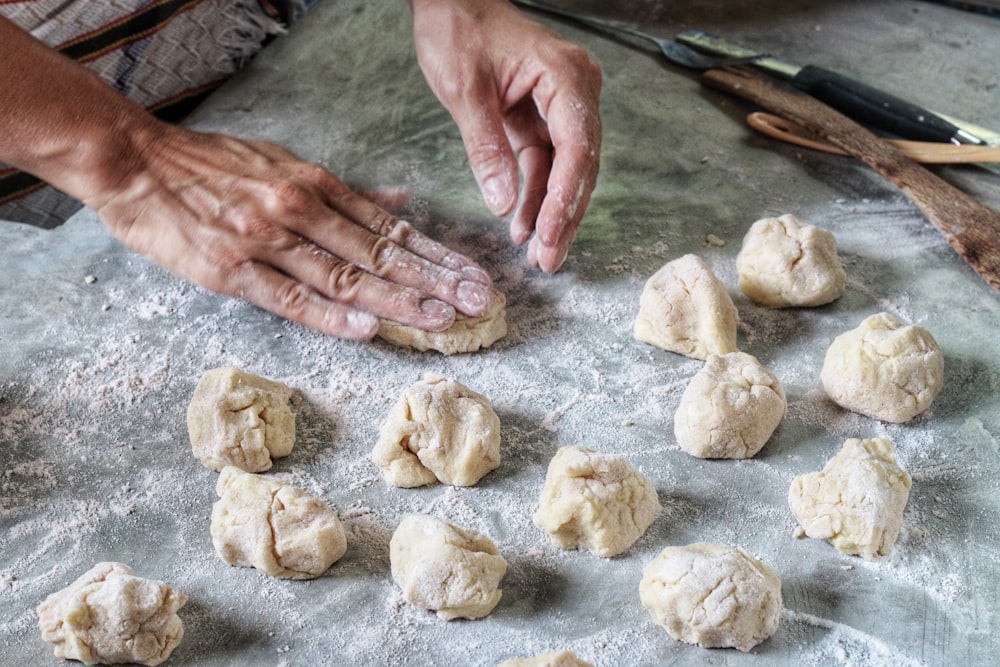 person making pastry dough