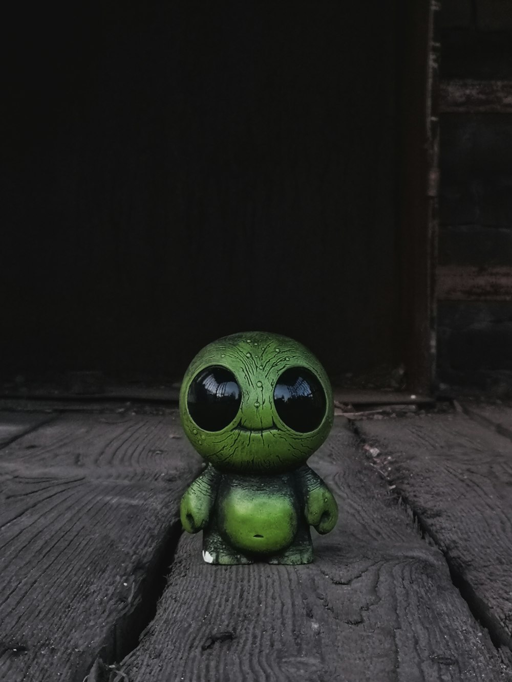 green alien character figurine