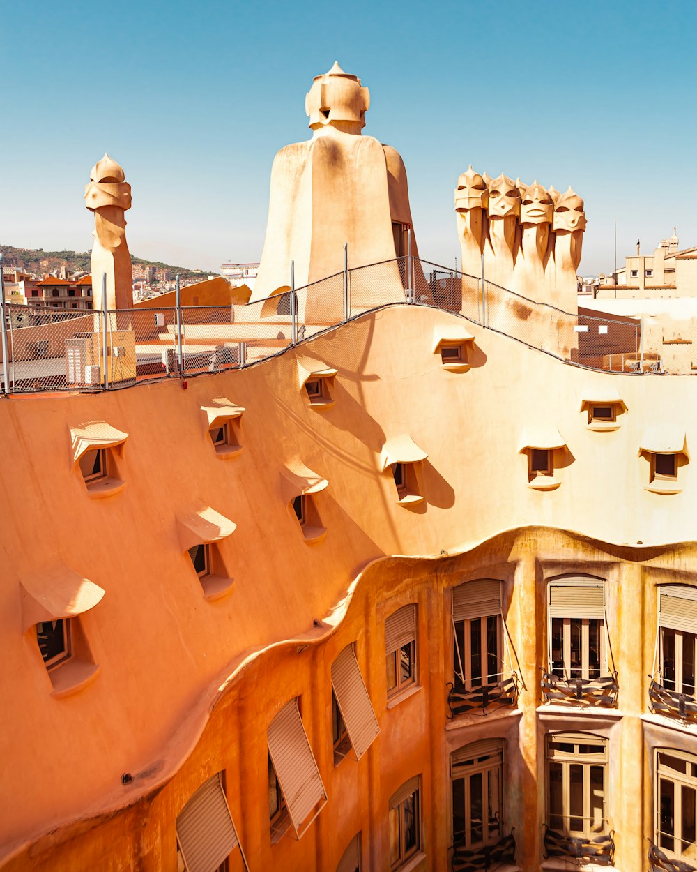 the roof of a building with many windows