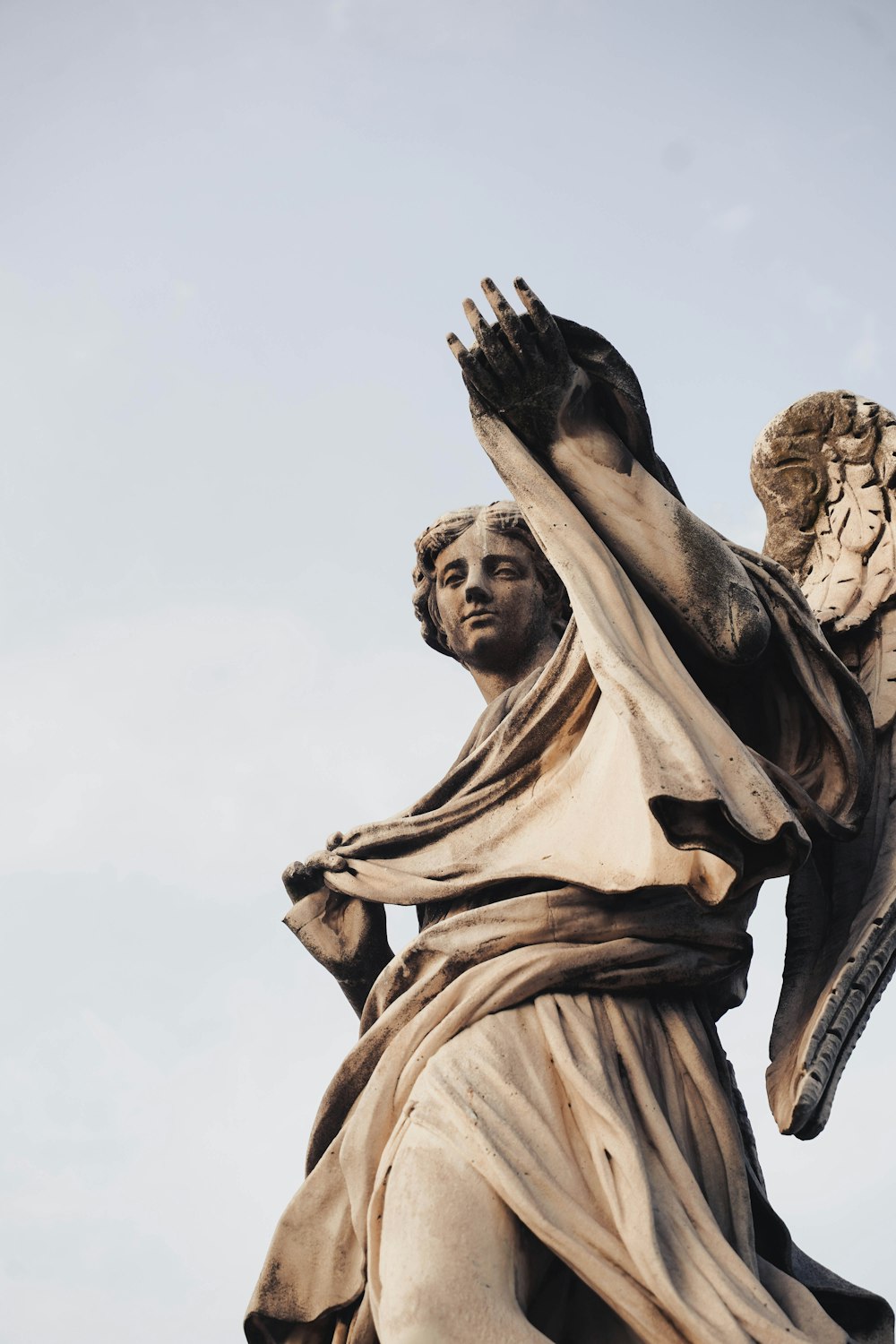 angel statue during daytime