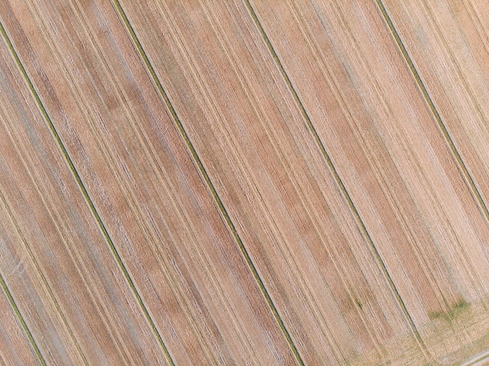 an aerial view of a plowed field