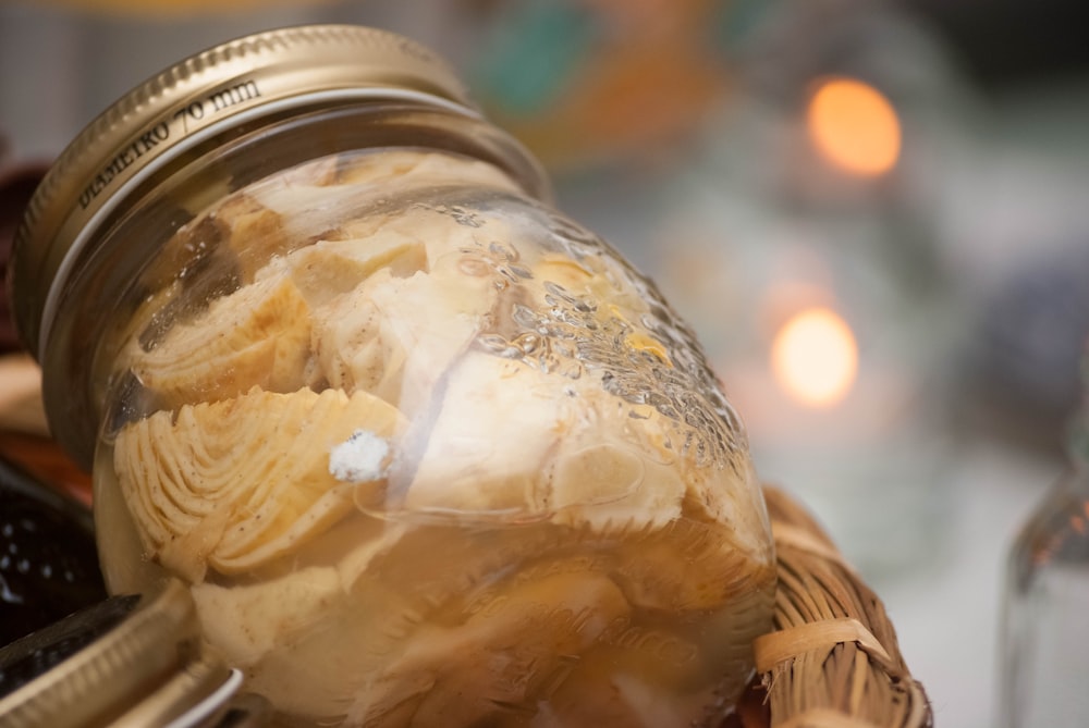 fermented vegetable in clear glass jar