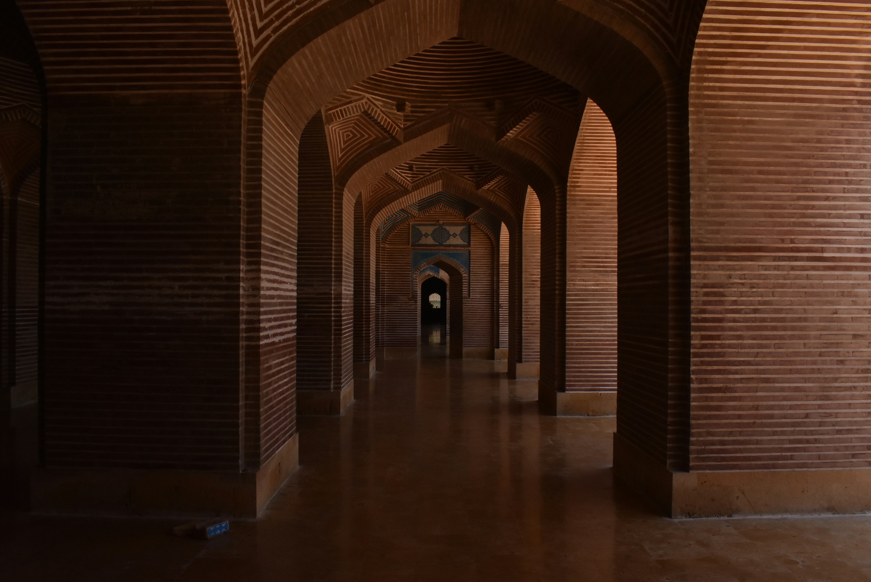 brown concrete building showing hallay