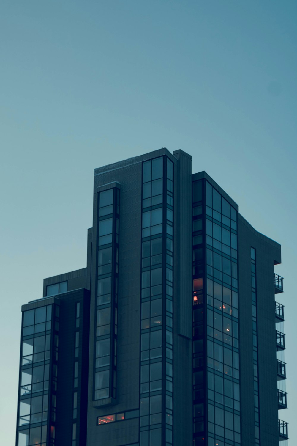 gray glass walled high-rise buildings during daytime