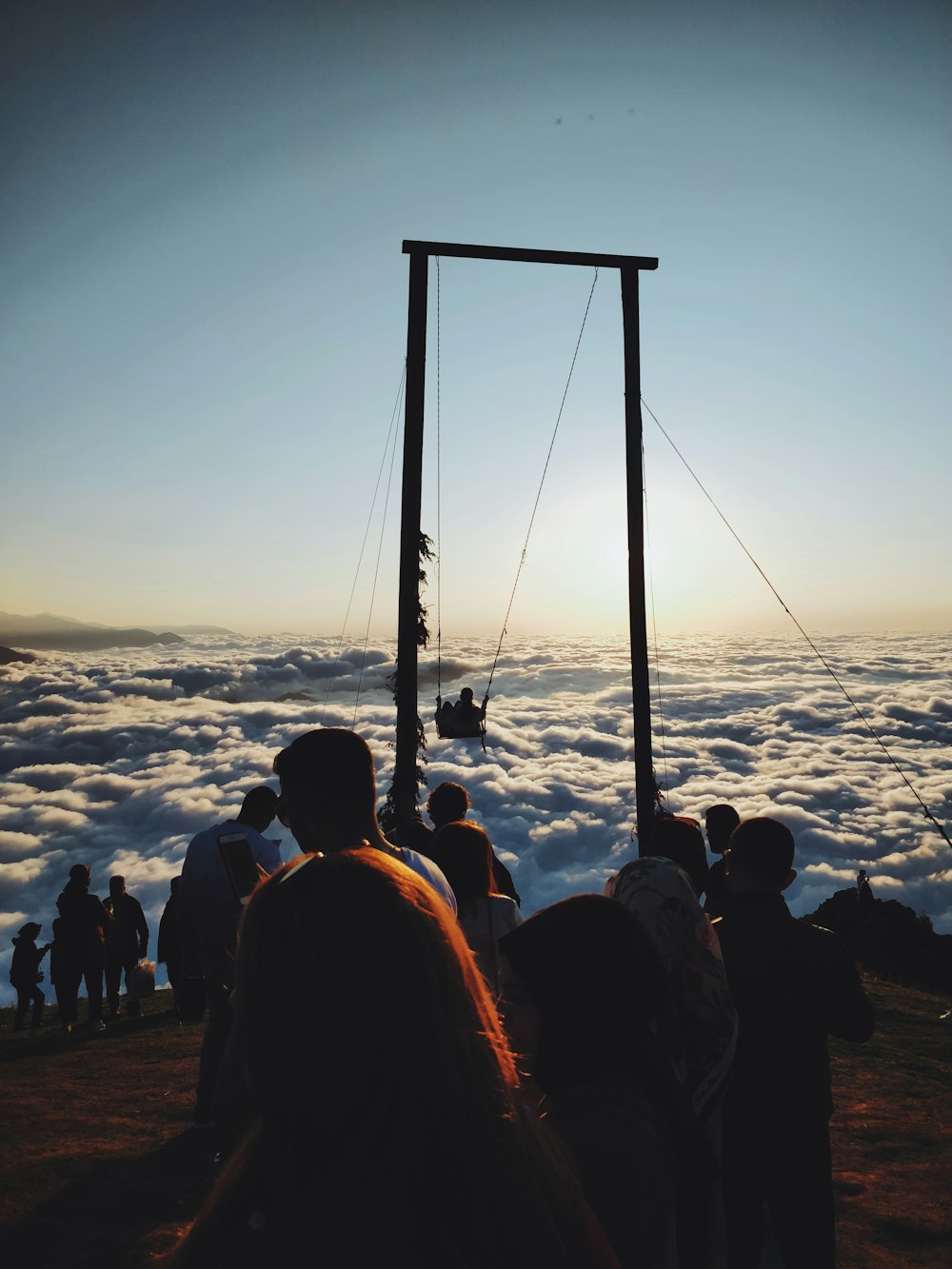 people beside cliff