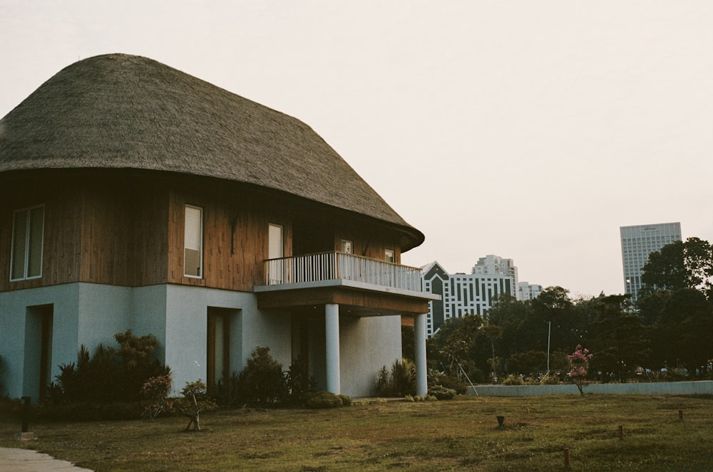 white and brown house under blue sky during daytime