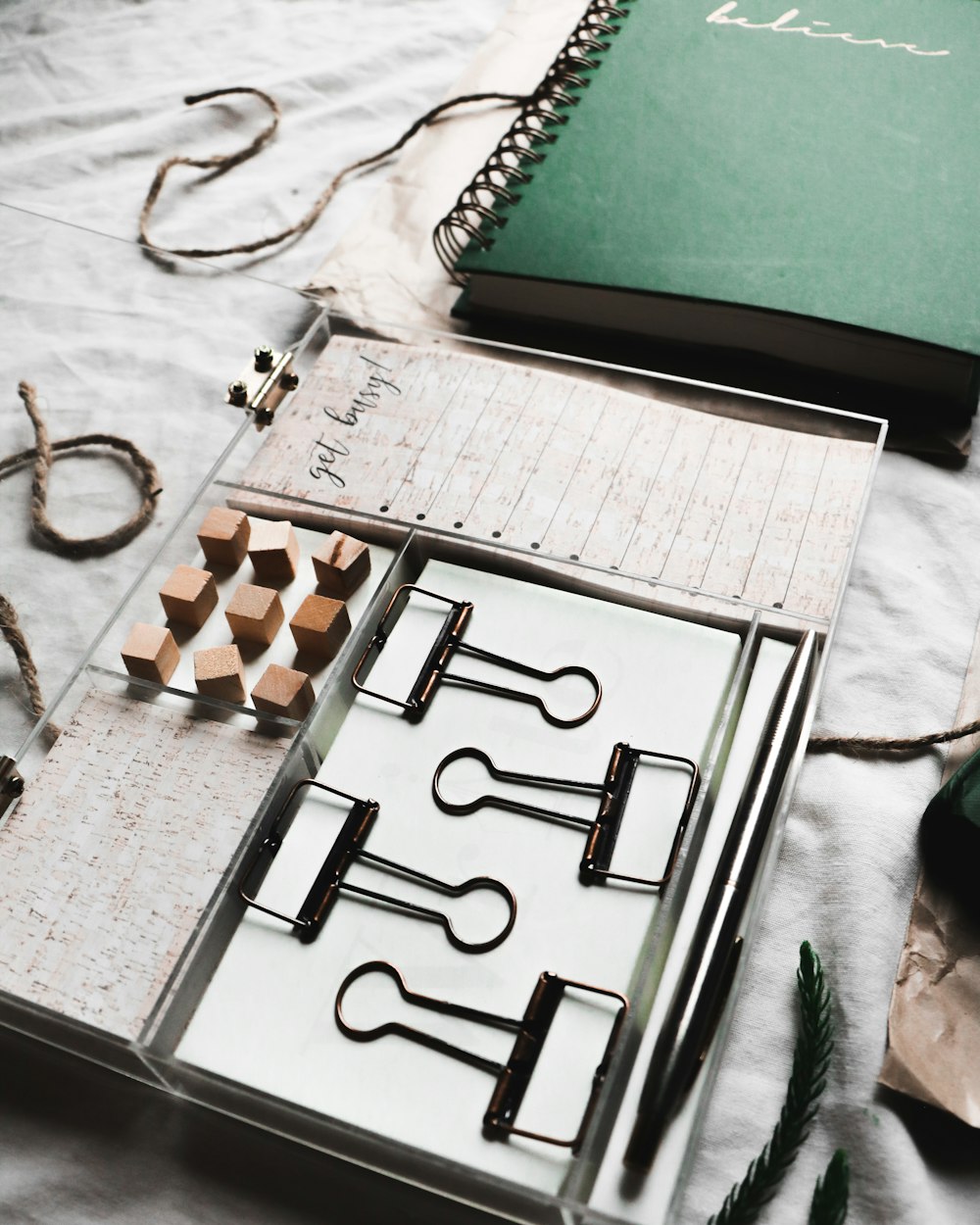 four balck paper clips