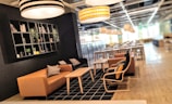 A cozy lounge area with comfortable seating and a coffee table.