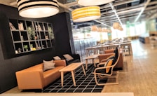 A cozy lounge area with comfortable seating and a coffee table.