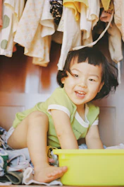 smiling girl wearing green shirt