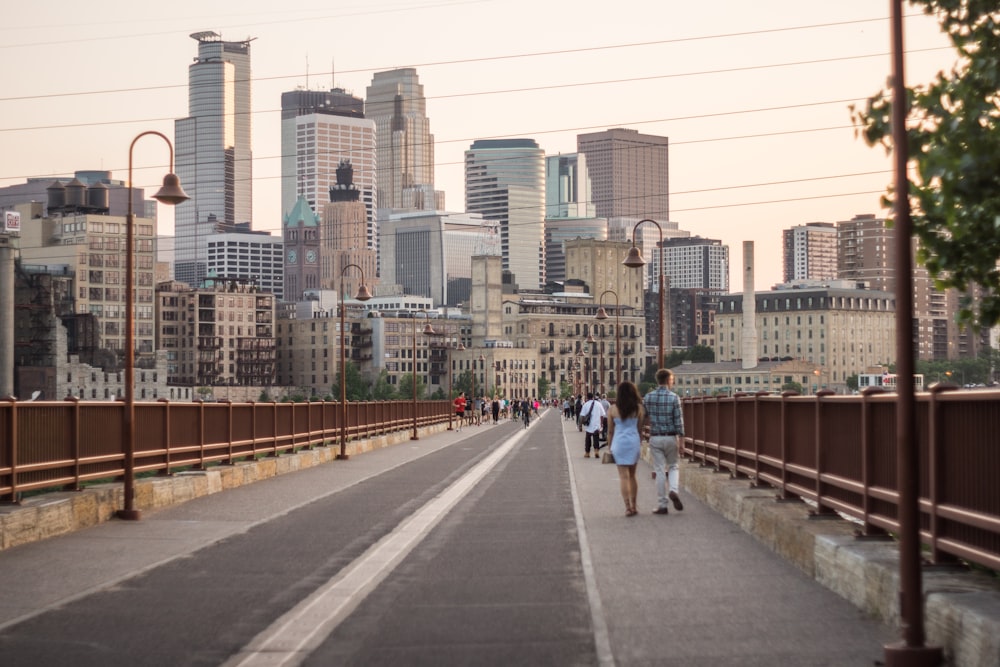 people walking on sidwalk