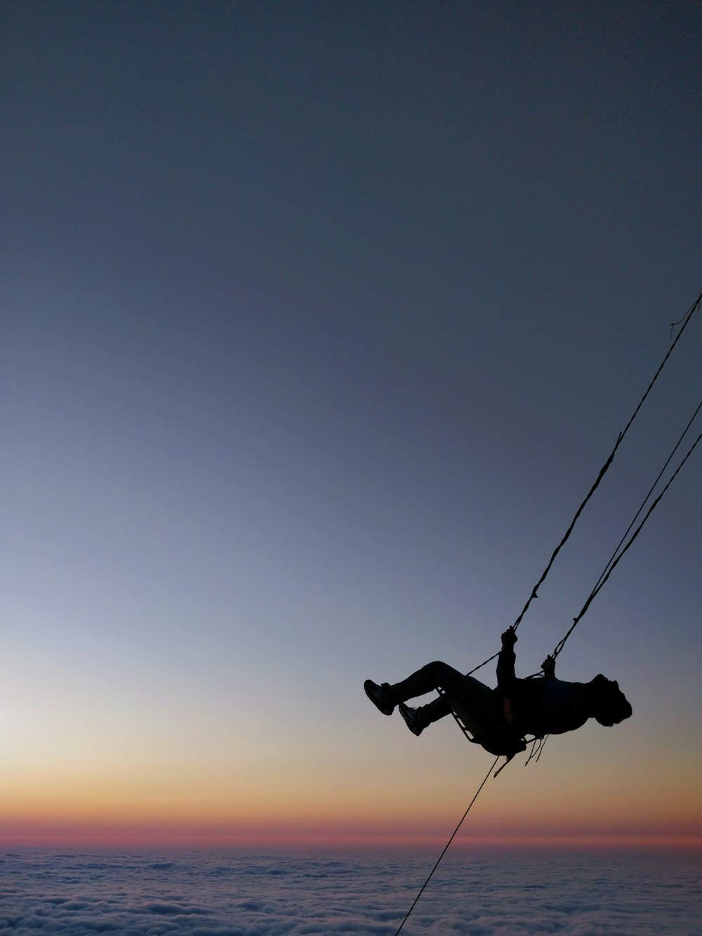 person riding on swing