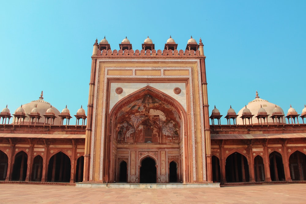 architectural photography of brown and white temple