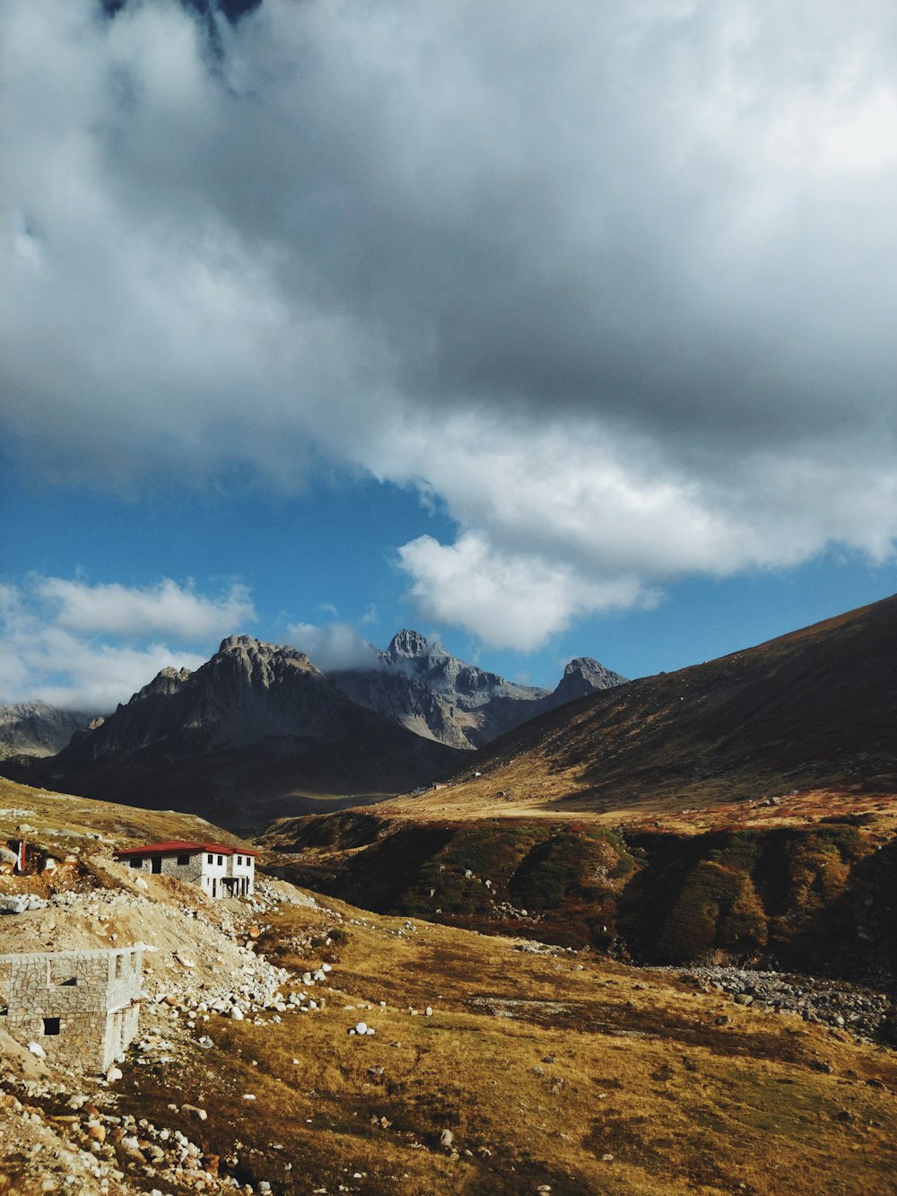 landscape photo of black and green mountain ranges