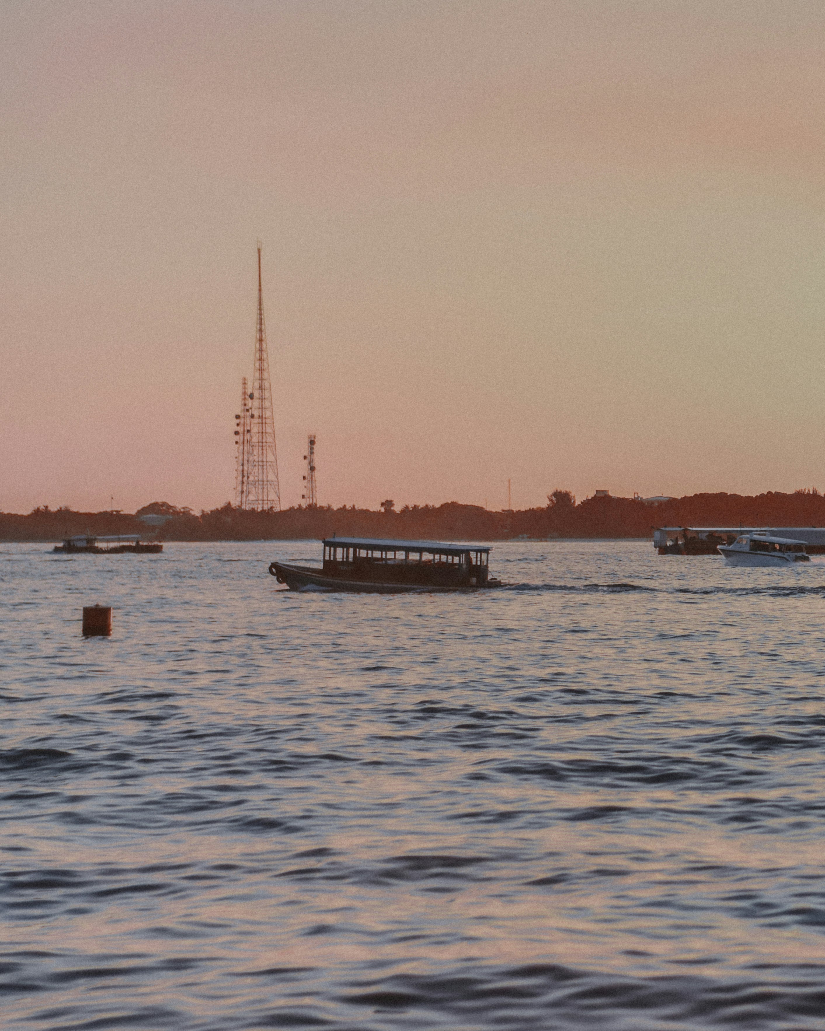 black and brown boat on ocean water