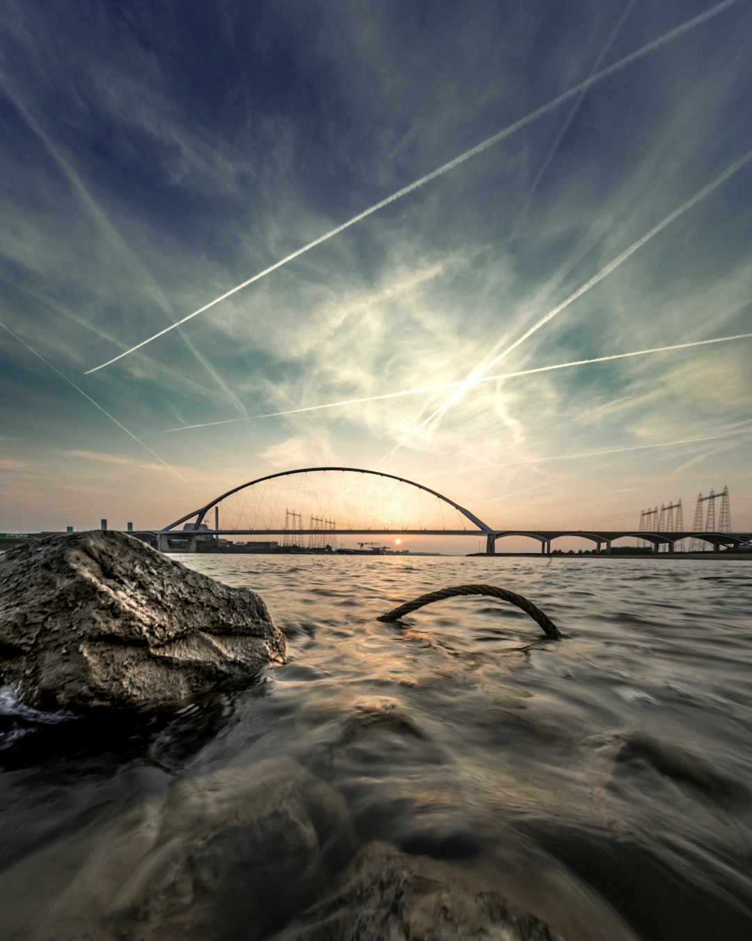 timelapse photography of rock and bridge