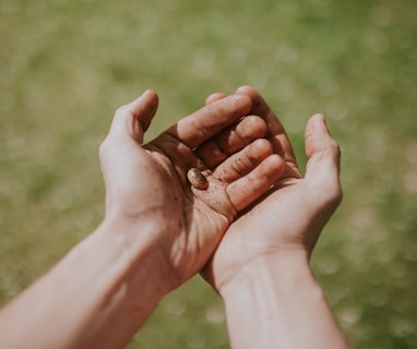 person's left hand over right hand