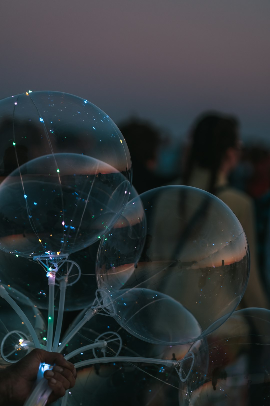 shallow focus photography of clear balloons