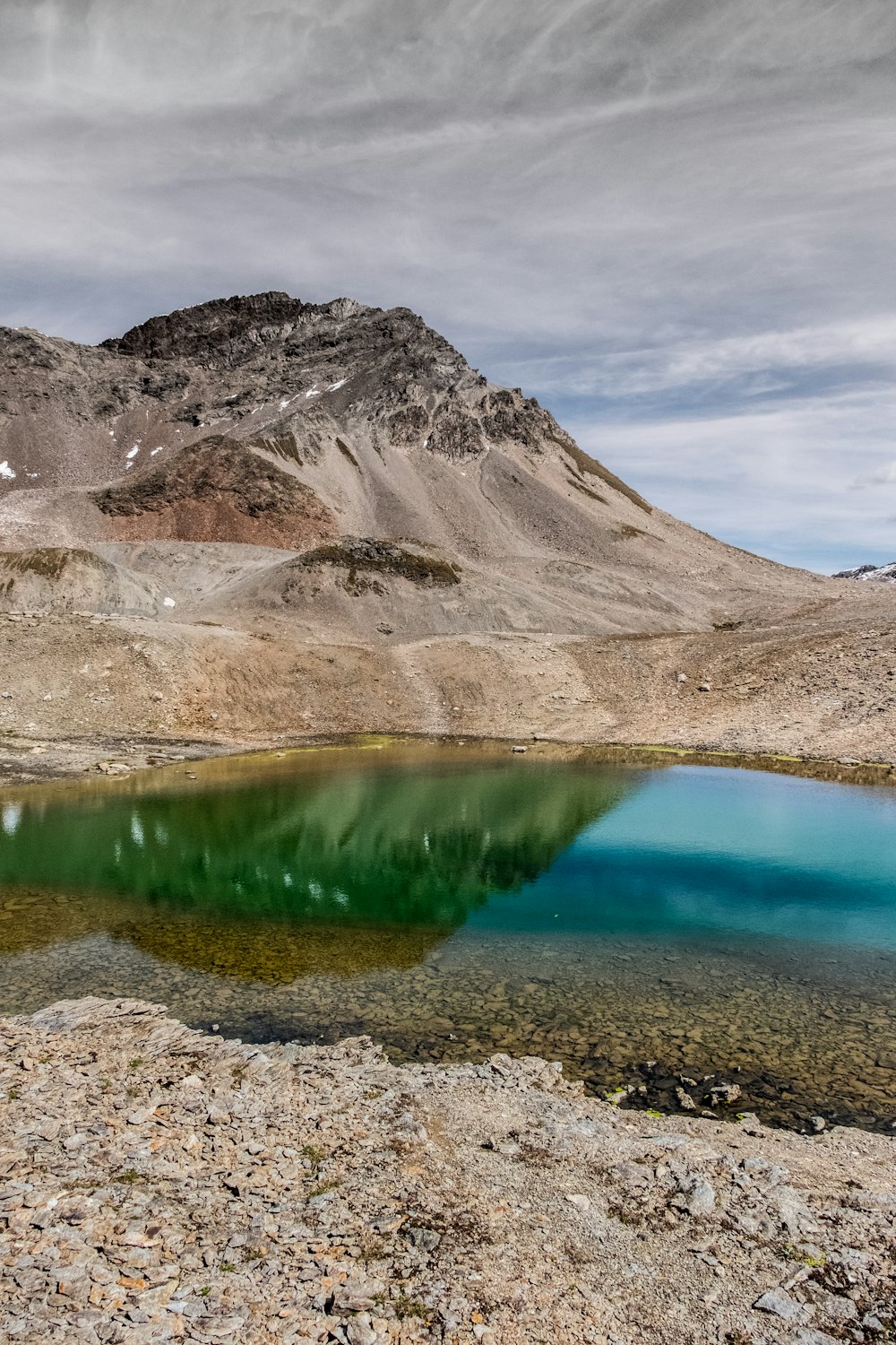 body of water near mountain