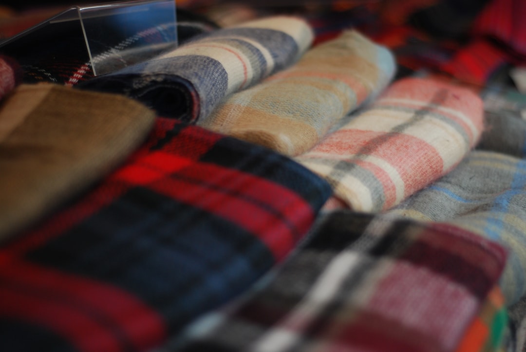 shallow focus photography of assorted-color textiles, Tartan Blankets – Plaid Blankets