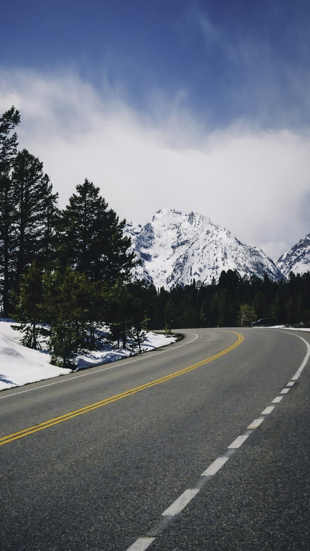 asphalt road across white mountain