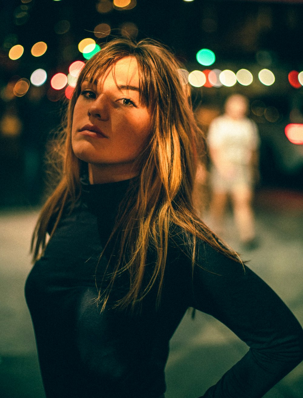 woman wearing turtleneck long-sleeved shirt