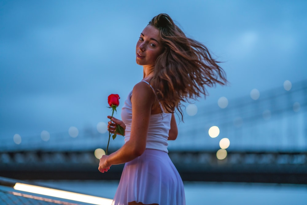 woman holding rose