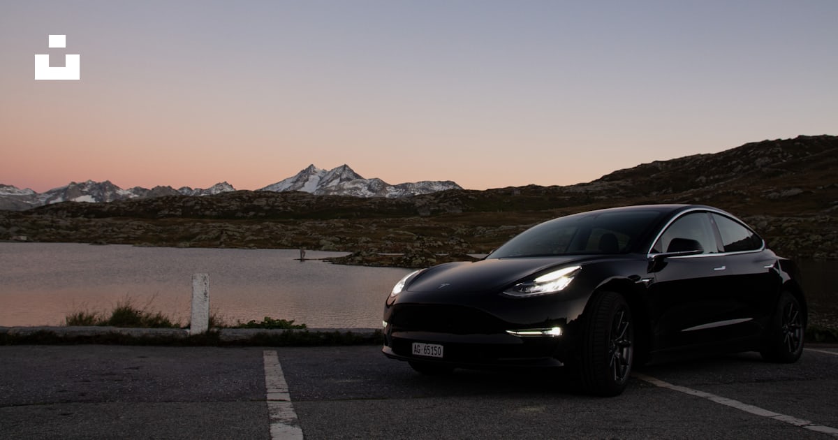 Black sedan photo Free Grimselpass Image on Unsplash