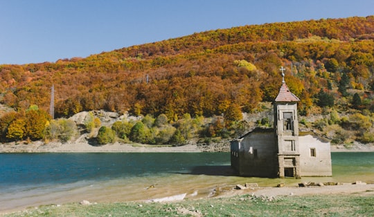 chapel surrounded by water in Mavrovo Lake North Macedonia
