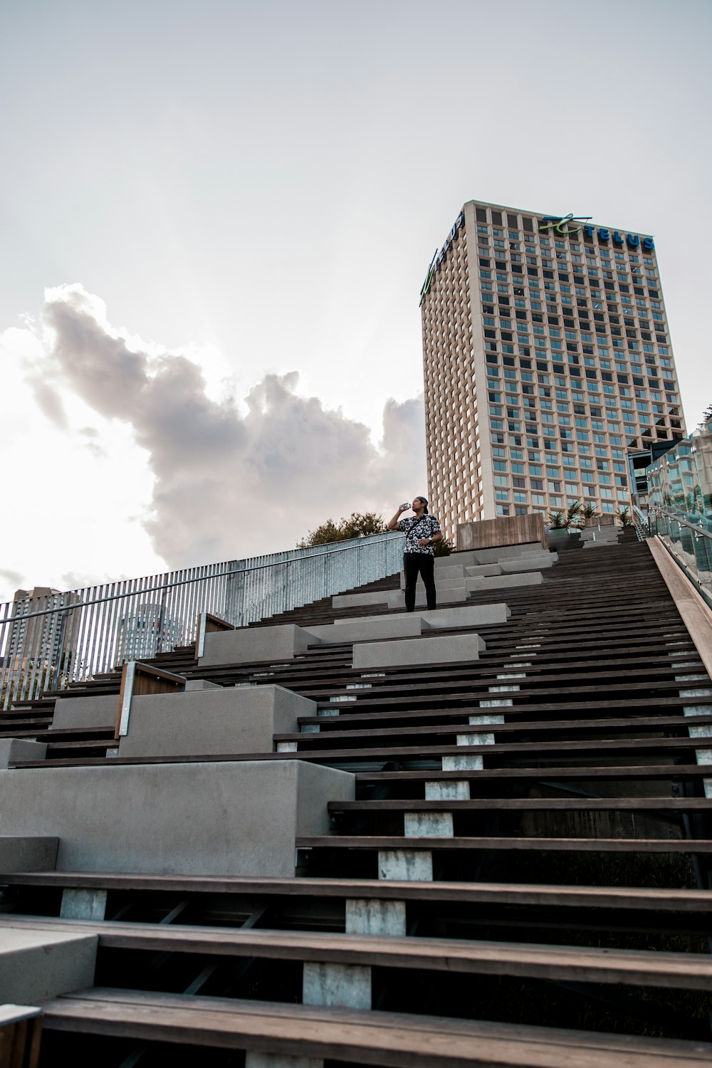 person standing on stairs during day