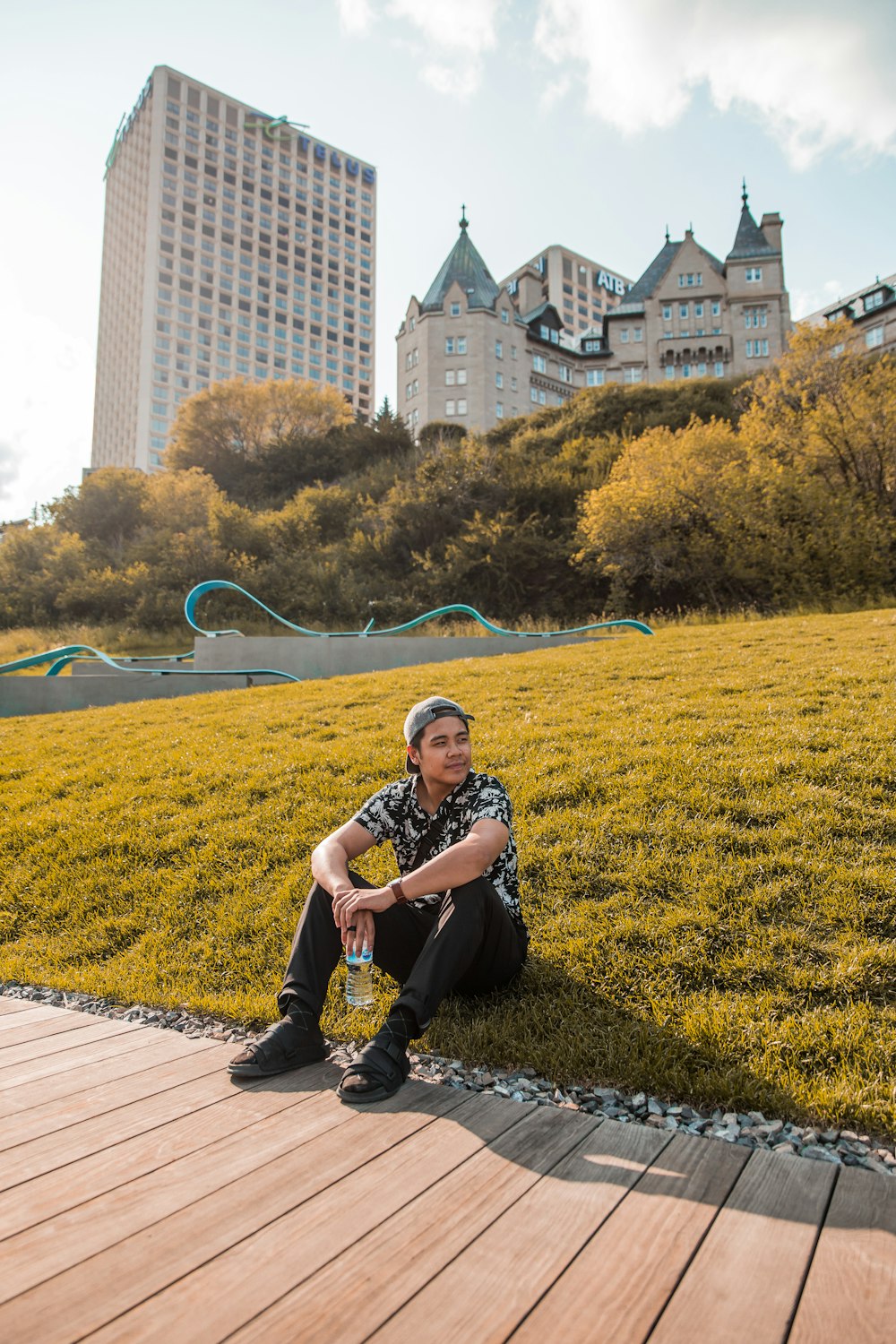 man sitting on grass