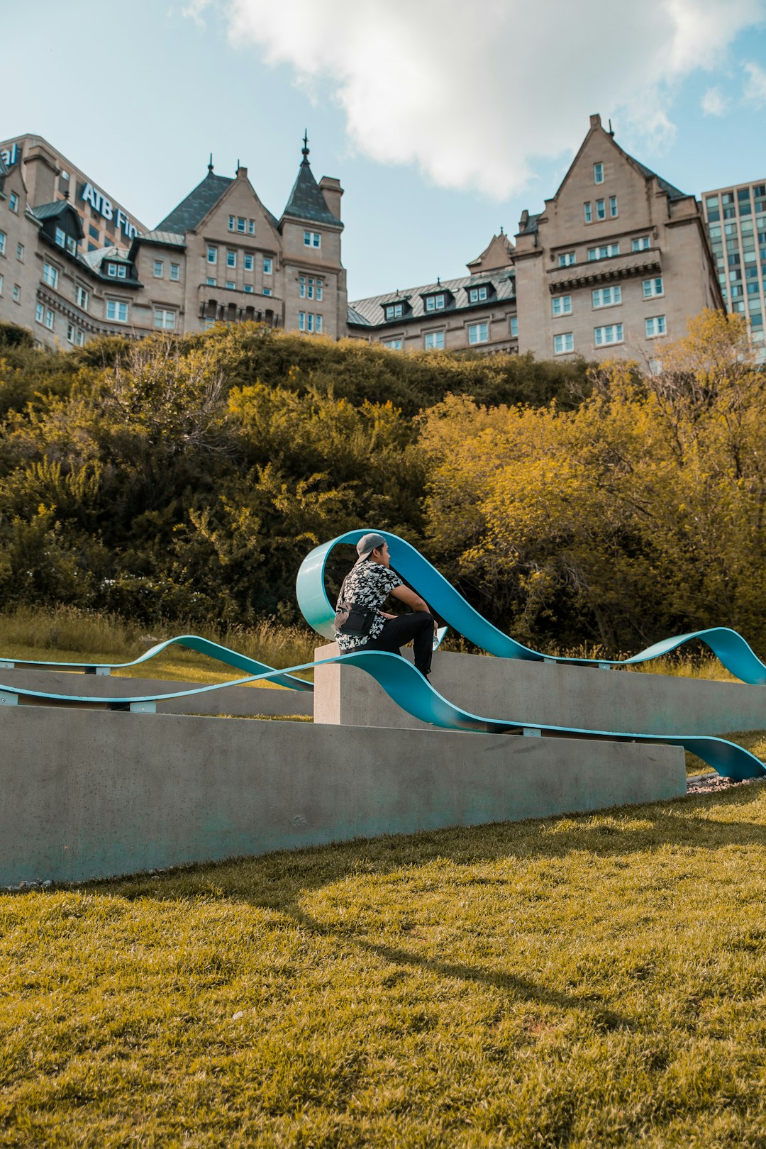 man sitting on slide