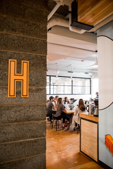 wall with letter H sign