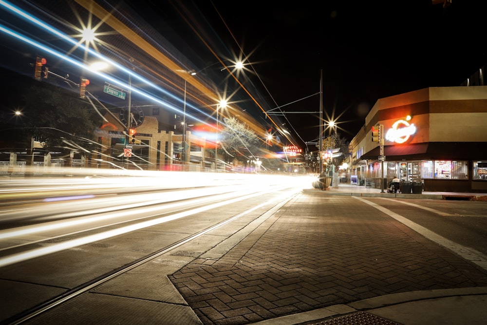 time lapse photography of cars on road