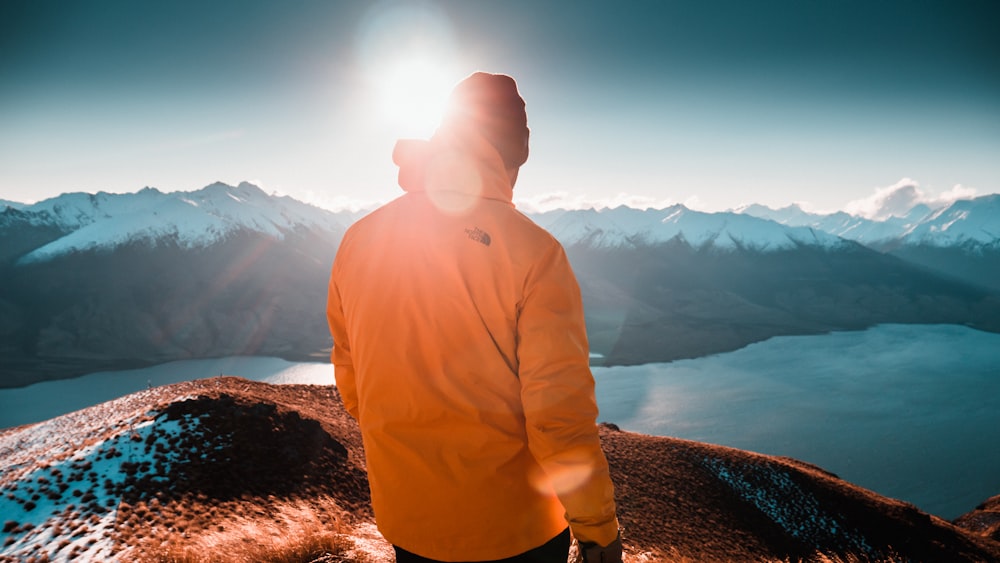 man stands on mountain