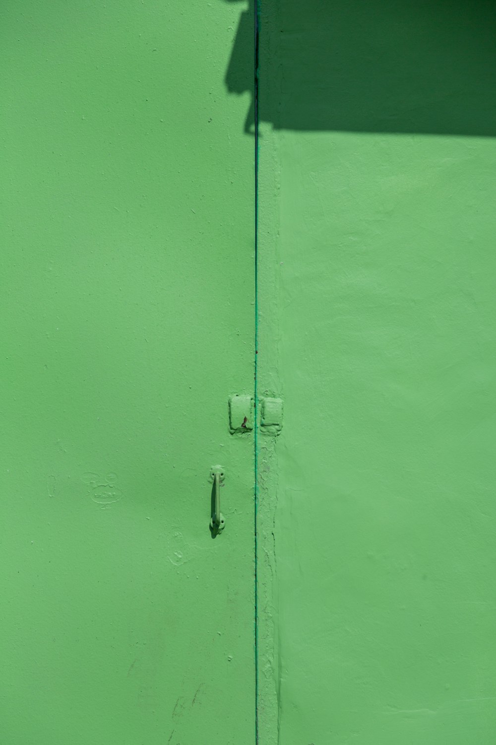 green-painted door