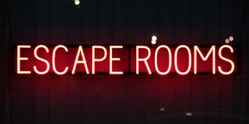 red escape rooms neon sign