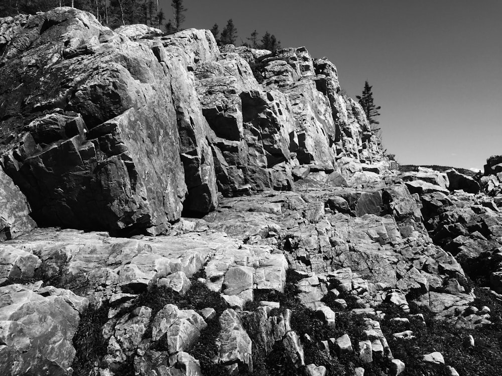 grayscale photography of rock formation