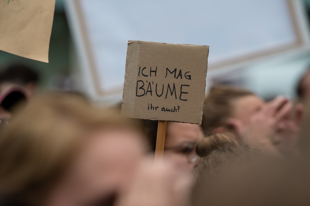 shallow focus photo of brown signage