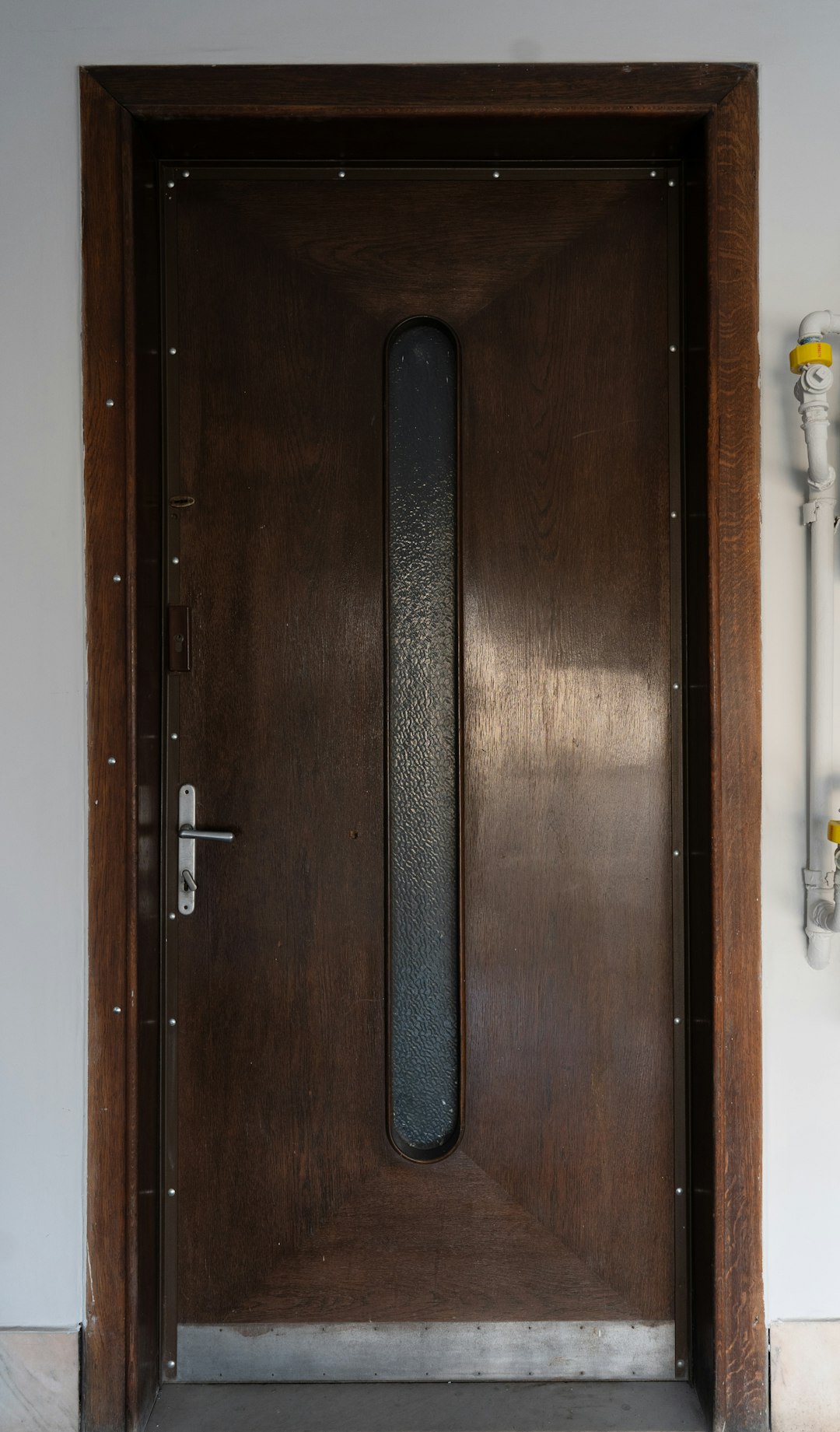 closed brown wooden door