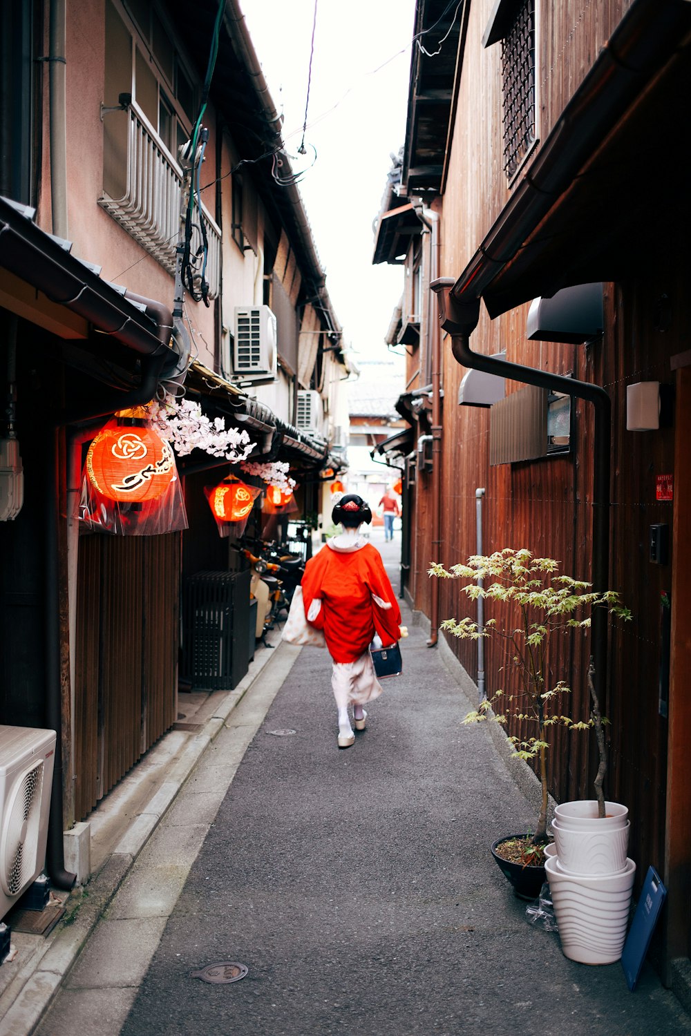 woman walking near the building